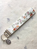 St. Joseph Key Fob Wristlet - Catholic Keychain - Floral Encounter At Jacob's Well